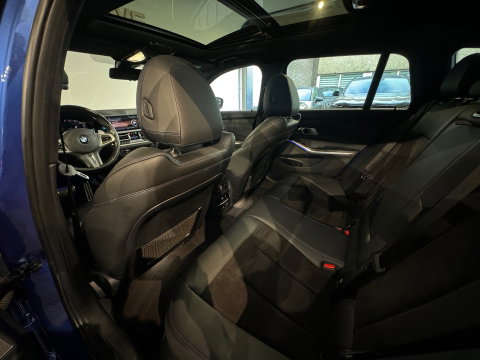 BMW 3 Serie Touring 330i Pano|Harman Kardon|HuD|Trekhaak|Keyless|Laser