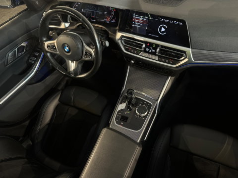 BMW 3 Serie Touring 330i Pano|Harman Kardon|HuD|Trekhaak|Keyless|Laser