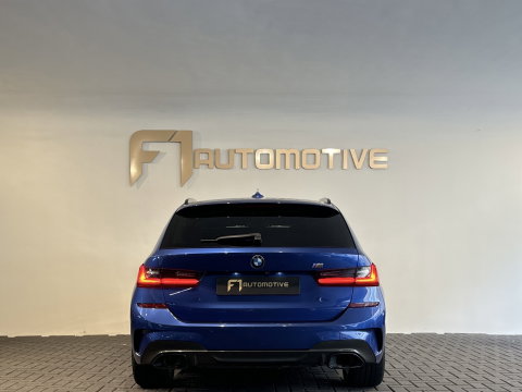 BMW 3 Serie Touring 330i Pano|Harman Kardon|HuD|Trekhaak|Keyless|Laser