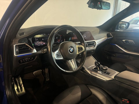 BMW 3 Serie Touring 330i Pano|Harman Kardon|HuD|Trekhaak|Keyless|Laser