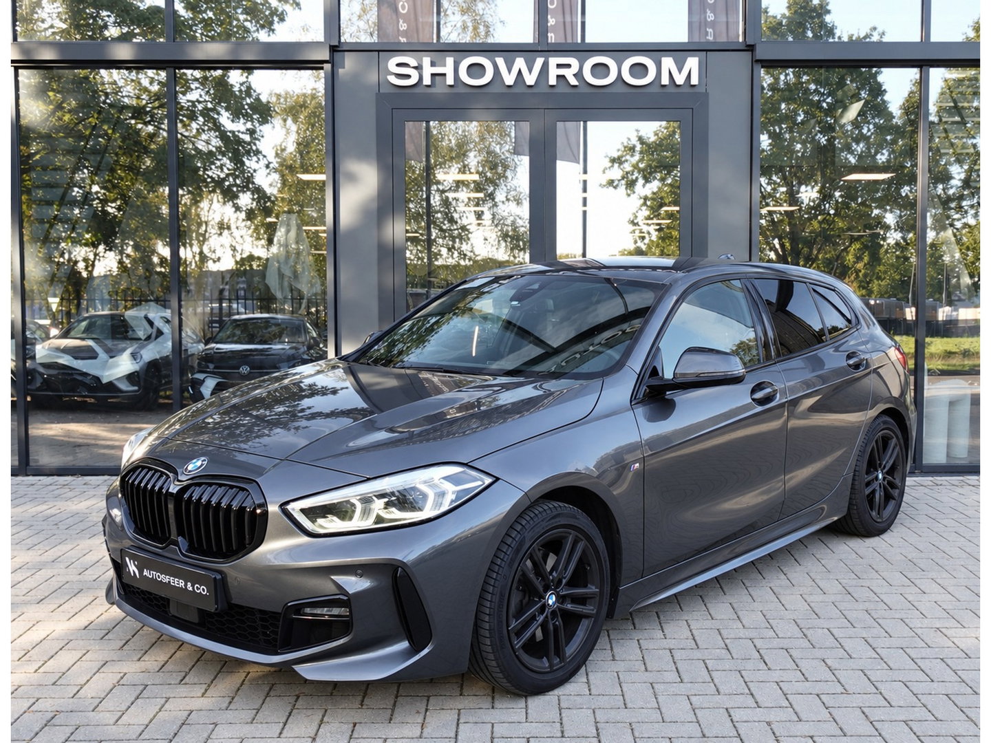 BMW 1-serie 118i High Executive M-PAKKET HUD SFEER ACC