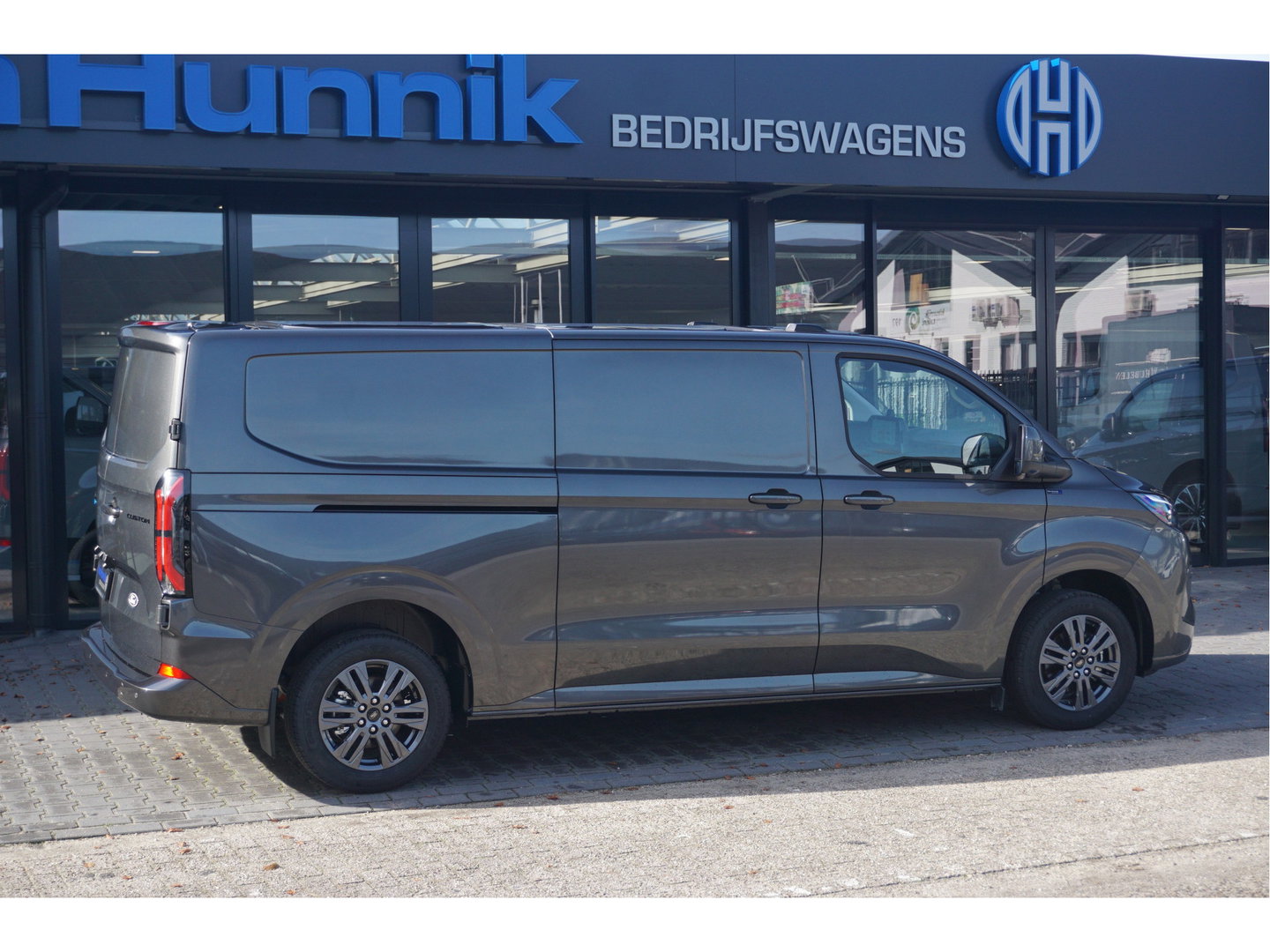 Ford Transit Custom 340L 218PK 71KWH Limited Elektrisch AUT BPM VRIJ!! Navi, ACC, 360° Cam, 17" LM, Trekhaak!! NR. EC32