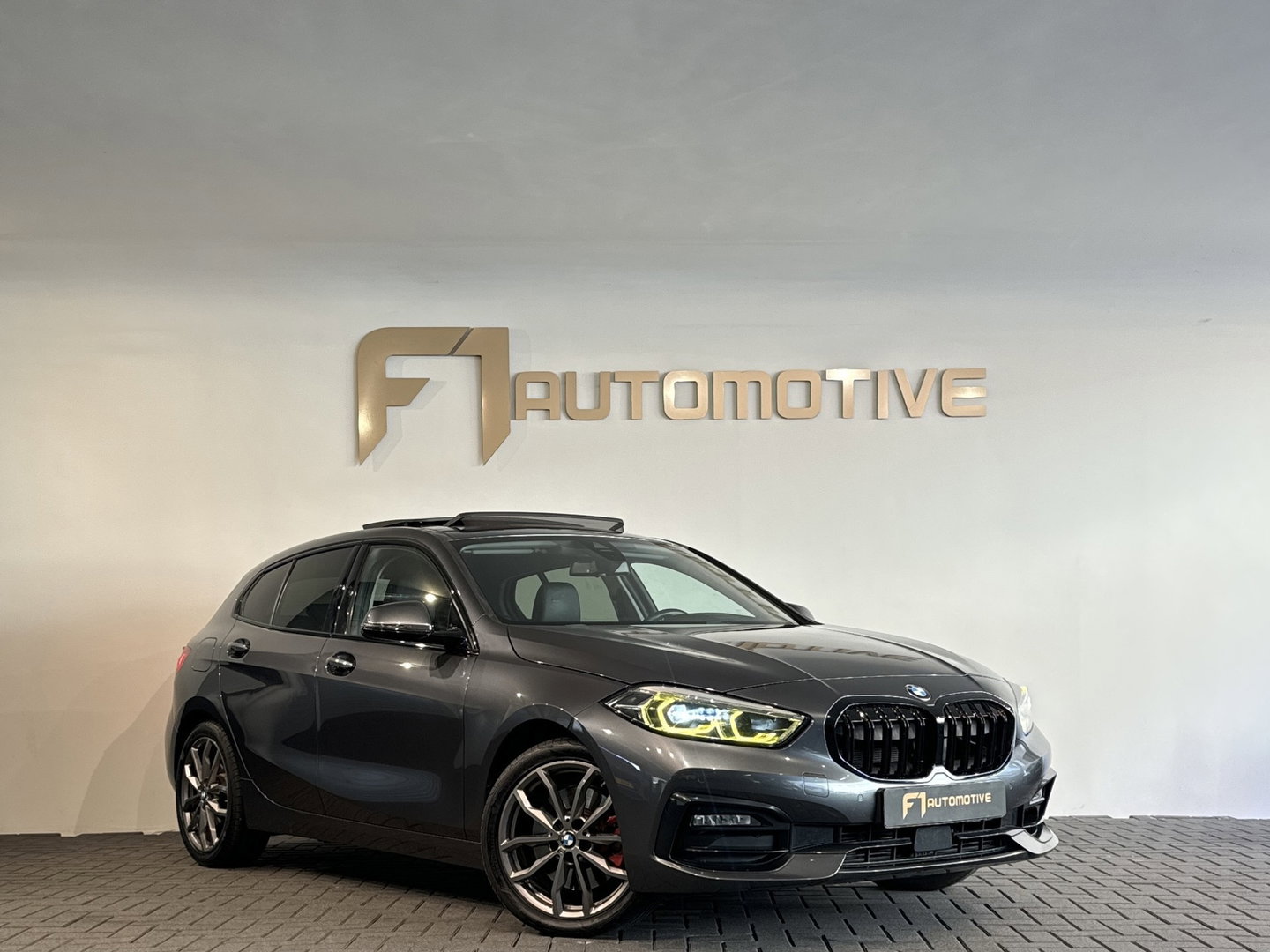 BMW 1-serie 120i High Executive Pano|Stoelverwarming|Cruise Control