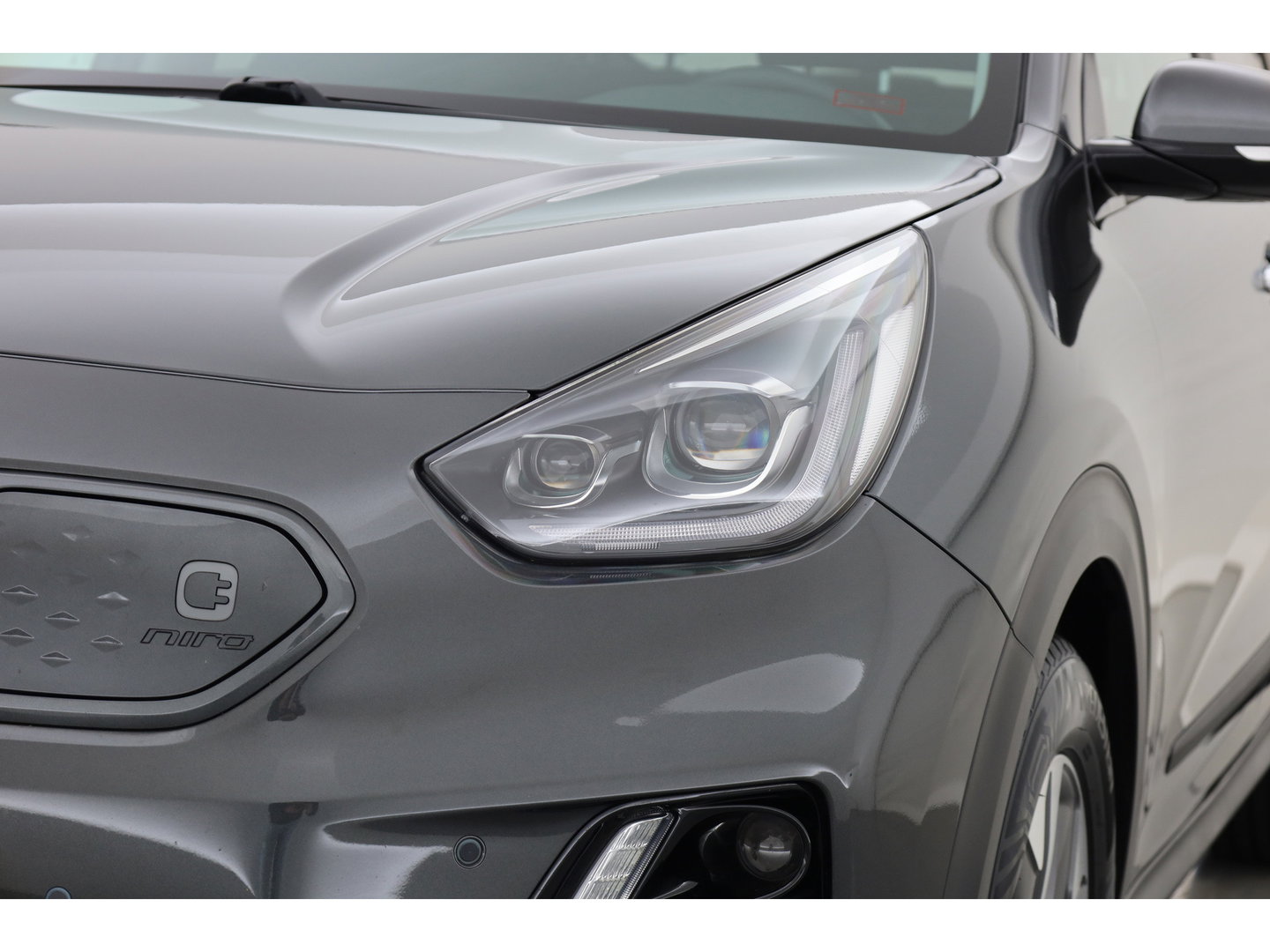 Kia e-Niro 64 kWh | SOH 100% | Rijklaar! | Leder | Stoelventilatie | Camera | Adapt. Cruise | All Seasons