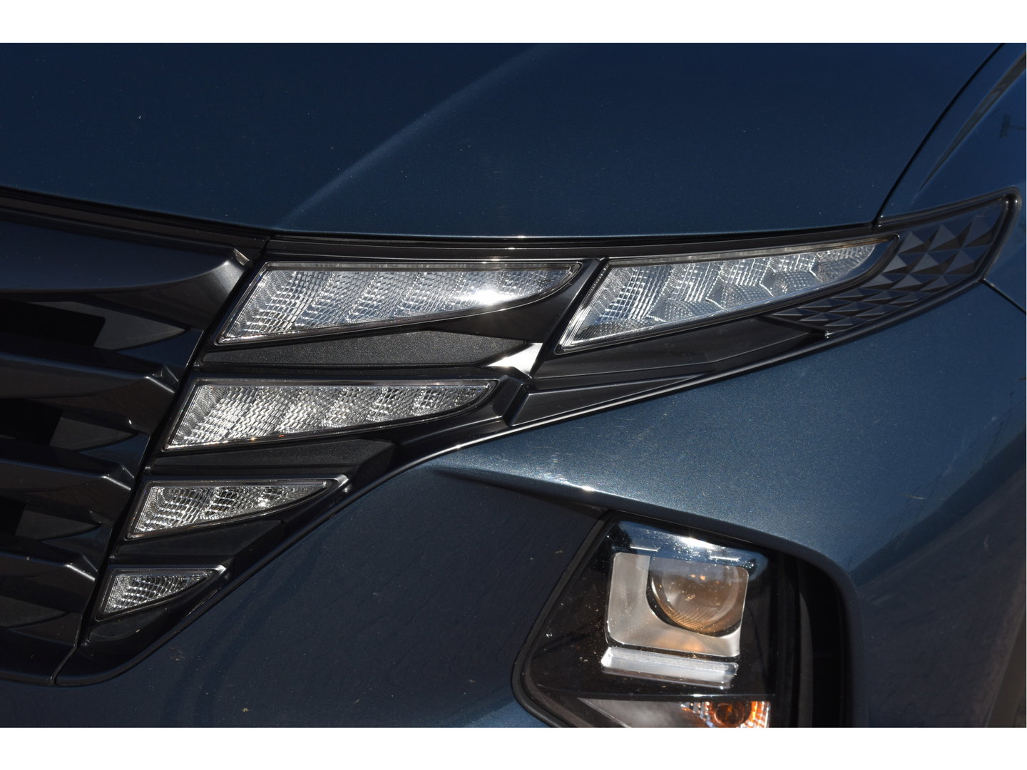 Hyundai Tucson 1.6 T-GDI HEV i-Motion 230 pk | NL-Auto | 1ste eigenaar | Afn.trekhaak | Carplay/Android | Camera | LM-Velgen Allseasons | NAP