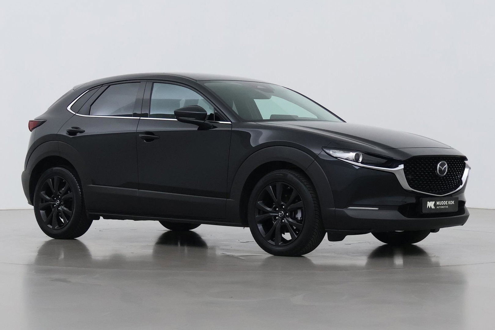 Mazda CX-30 2.5 e-SkyActiv-G M Hybrid Homura | Stoelverwarming | Head-Up | Camera | Keyless | Dodehoek | 18 Inch