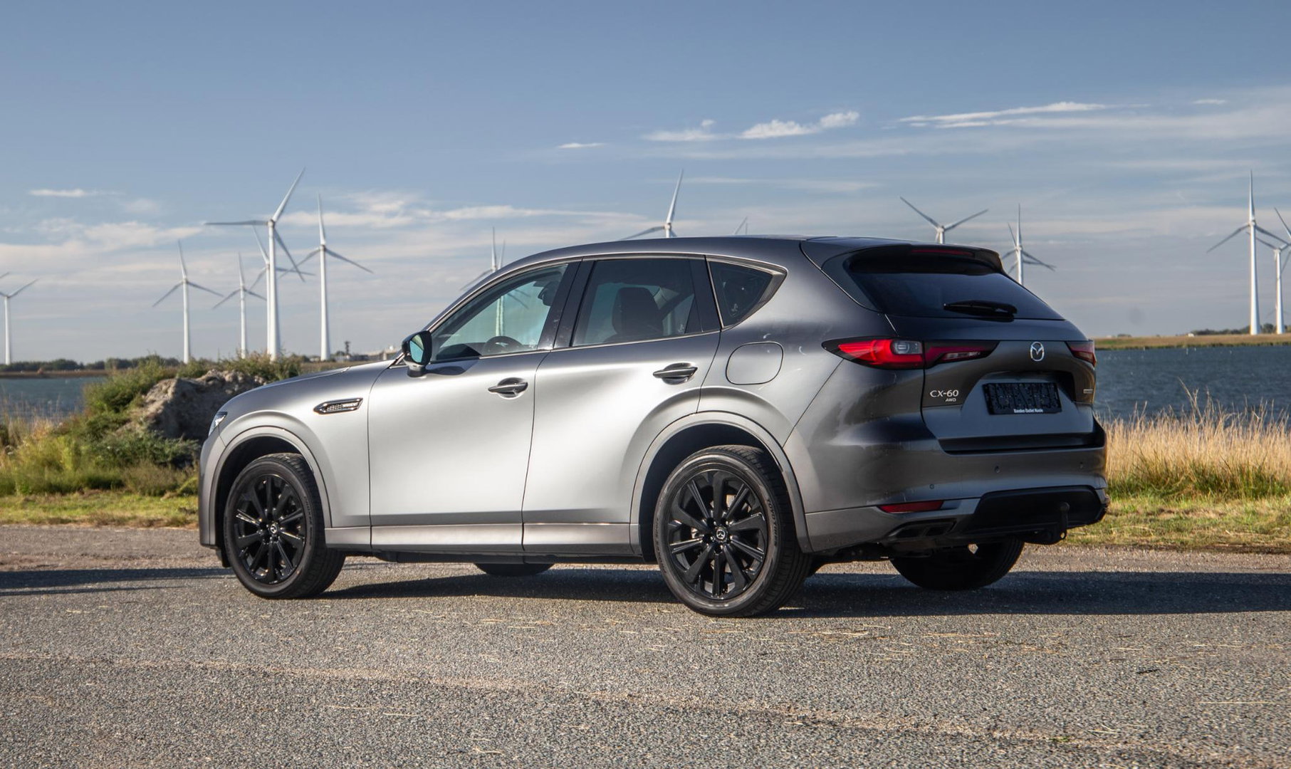 Mazda CX-60 2.5 e-SkyActiv PHEV Homura PANORAMA / TREKHAAK / 360 CAMERA / STOELVERWARMING + KOELING / CARPLAY / ADAPTIVE CRUISE