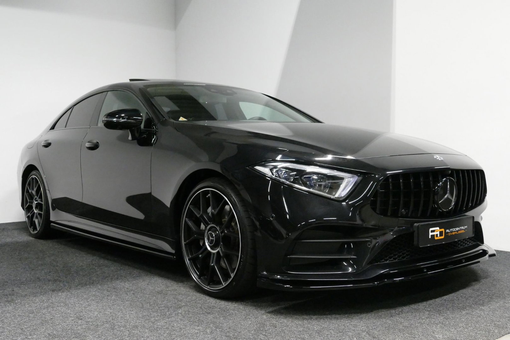 Mercedes-Benz CLS 450 4MATIC AMG Line / CLS63 AMG Diffuser / Panamericana Grille / Maxton Design Bodykit / Schuif-/kanteldak / Multibeam LED / Apple Carplay - Android Auto / 360 graden Camera / 20'' LMV / Stoelverwarming / Achteruitrijcamera / Dodehoek detectie
