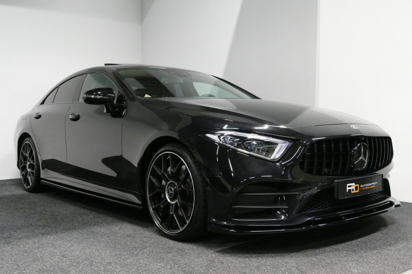 Mercedes-Benz CLS 450 4MATIC AMG Line / CLS63 AMG Diffuser / Panamericana Grille / Maxton Design Bodykit / Schuif-/kanteldak / Multibeam LED / Apple Carplay - Android Auto / 360 graden Camera / 20'' LMV / Stoelverwarming / Achteruitrijcamera / Dodehoek detectie