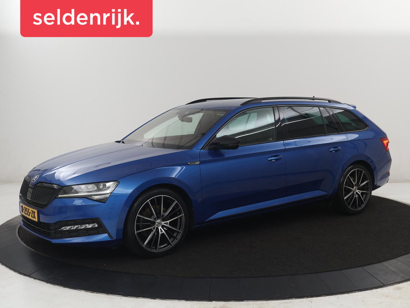 Škoda Superb Combi 1.5 TSI ACT Sportline Business | Leder/alcantara | Memory | Stoelverwarming | Virtueel dashboard | Park assist | Carplay | Navigatie | Climate control | Sfeerverlichting | Elektrische achterklep