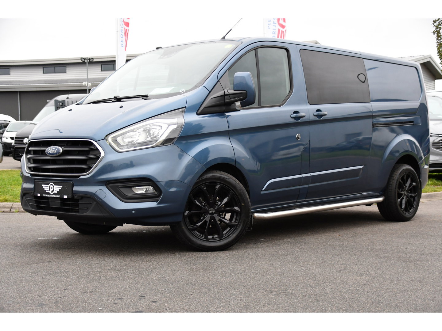 Ford Transit Custom 300 2.0 TDCI L2H1 Limited DC Adaptieve Cruise, Camera, Cruise, 2 x Schuifdeur, 130pk, Automaat, Trekhaak, Stoelverwarming, Sensoren, Uniek!