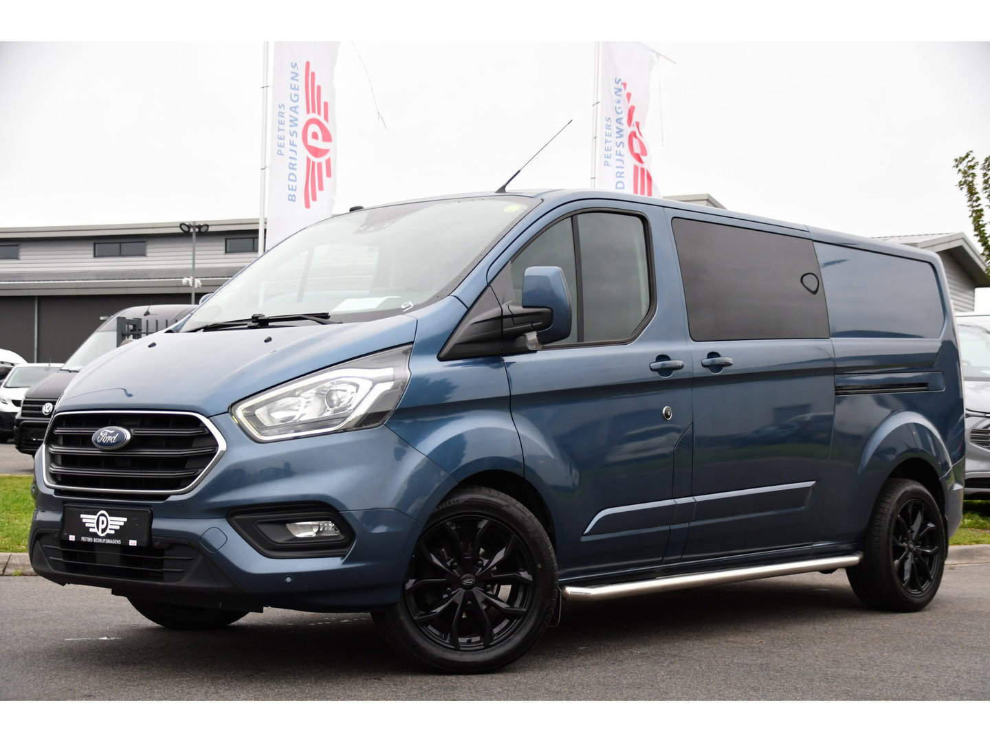 Ford Transit Custom 300 2.0 TDCI L2H1 Limited DC Adaptieve Cruise, Camera, Cruise, 2 x Schuifdeur, 130pk, Automaat, Trekhaak, Stoelverwarming, Sensoren, Uniek!