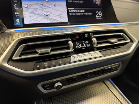 BMW X5 xDrive45e High Executive M Sport | Sky Lounge | Driving Assistant Pro | HUD | 22” | Luchtvering M Pakket