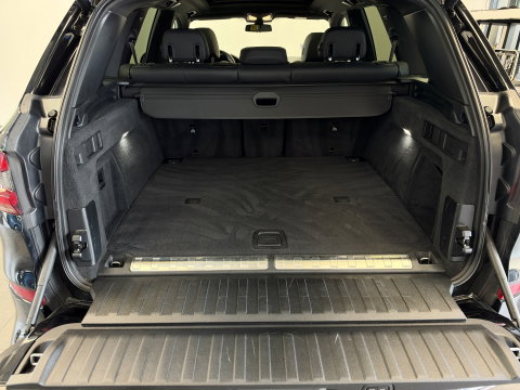 BMW X5 xDrive45e High Executive M Sport | Sky Lounge | Driving Assistant Pro | HUD | 22” | Luchtvering M Pakket
