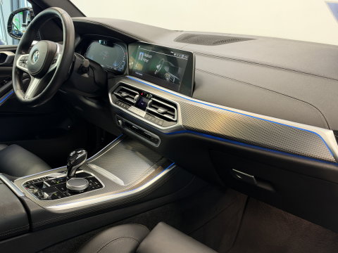 BMW X5 xDrive45e High Executive M Sport | Sky Lounge | Driving Assistant Pro | HUD | 22” | Luchtvering M Pakket